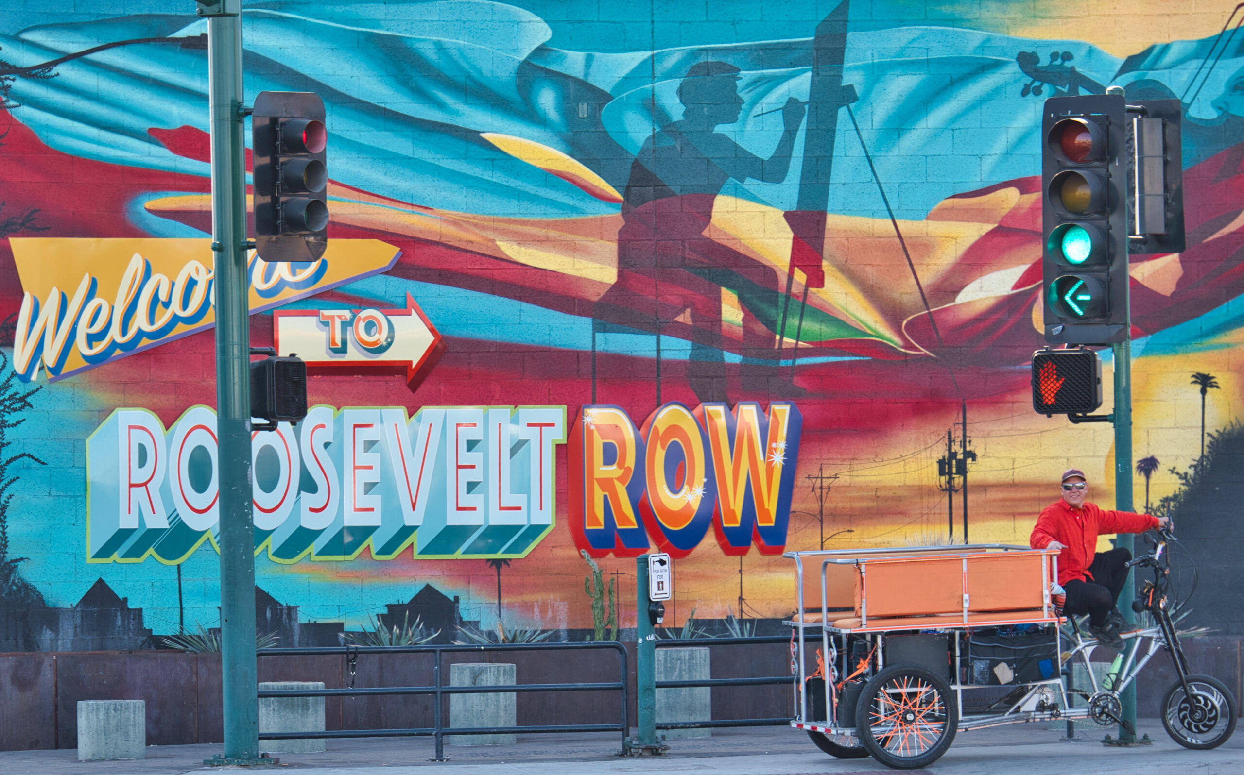 Roosevelt Row Mural image of the Welcome to Roosevelt Row mural with a pedicab next to it